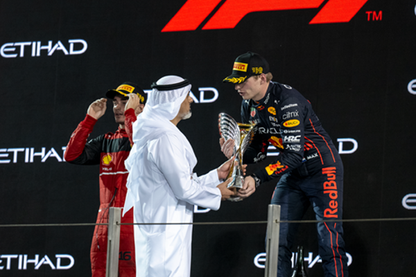 Khaled bin Mohamed bin Zayed presents 2022 Formula 1 Abu Dhabi Grand Prix Champion Max Verstappen with winner’s trophy